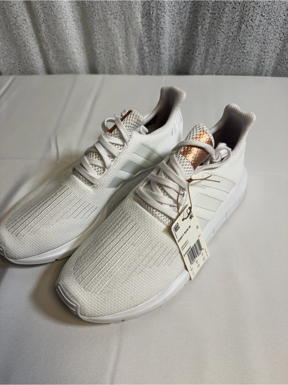 adidas Women's White Athletic Sneakers with Rose Gold Accent